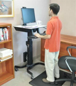 Ergotron WorkFit-C Single LD Sit-Stand Workstation -Logitech sHOP 24 215 085 inuse2 560x500 55424.1702837252